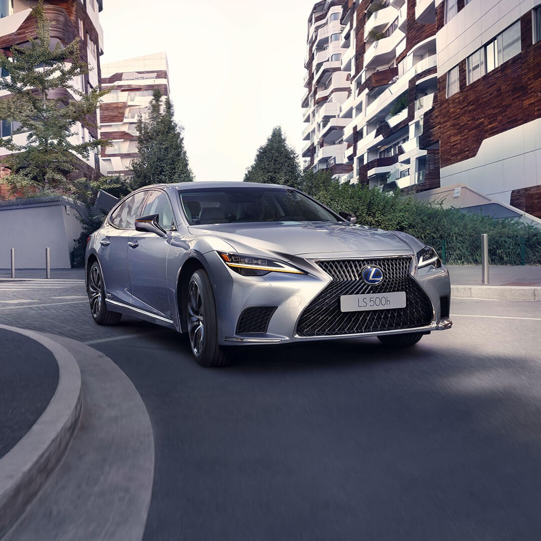 Lexus LS driving in a city location 